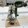 Jack JK-8569ADI-02BB, промислова розпошивальна машина з вбудованим сервомотором і врізним окантовувачем