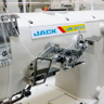 Jack JK-8569ADI-05CB, промислова розпошивальна машина з вбудованим сервомотором і пристроєм для вшивання резинки