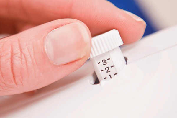 Регулювання тиску притискної лапки Brother 4234D